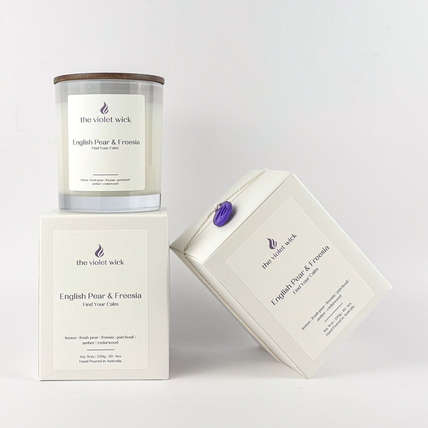 English Pear & Freesia soy candle by The Violet Wick on white background