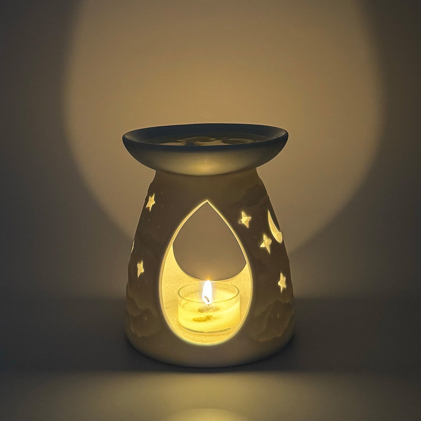 White Porcelain Tealight Burner from The Violet Wick, Moon and Stars design