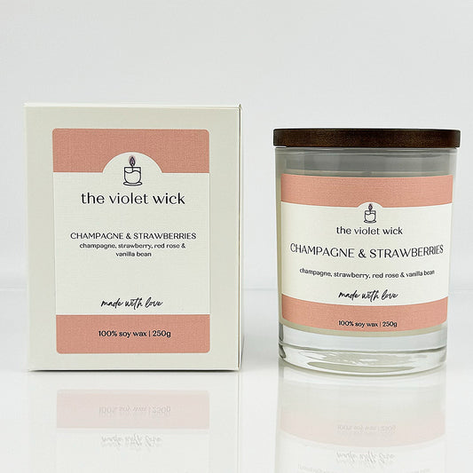 Champagne &. Strawberries scented soy candle from The Violet Wick in a glass jar with timber lid, 250g.