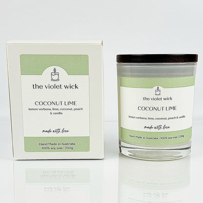 Coconut Lime scented soy candle from The Violet Wick in a glass jar and timber lid, 250g.