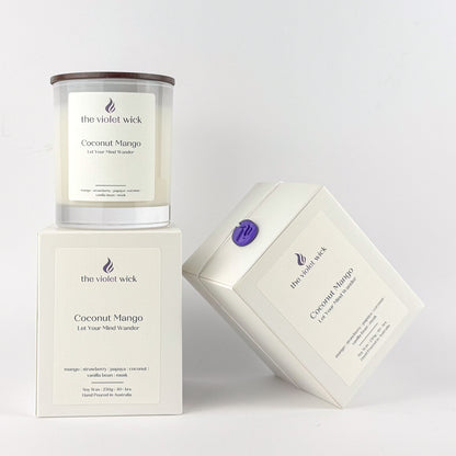Coconut Mango soy candle by The Violet Wick on a white background