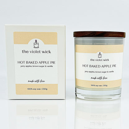 Hot Baked Apple Pie scented soy candle from The Violet Wick, in a glass jar and timber lid, 250g.