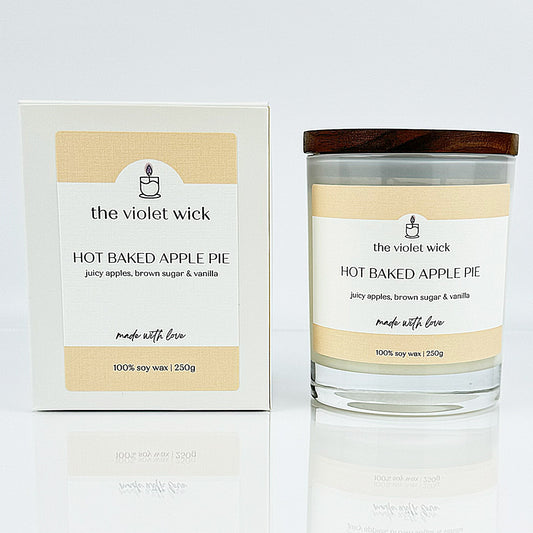 Hot Baked Apple Pie scented soy candle from The Violet Wick, in a glass jar and timber lid, 250g.