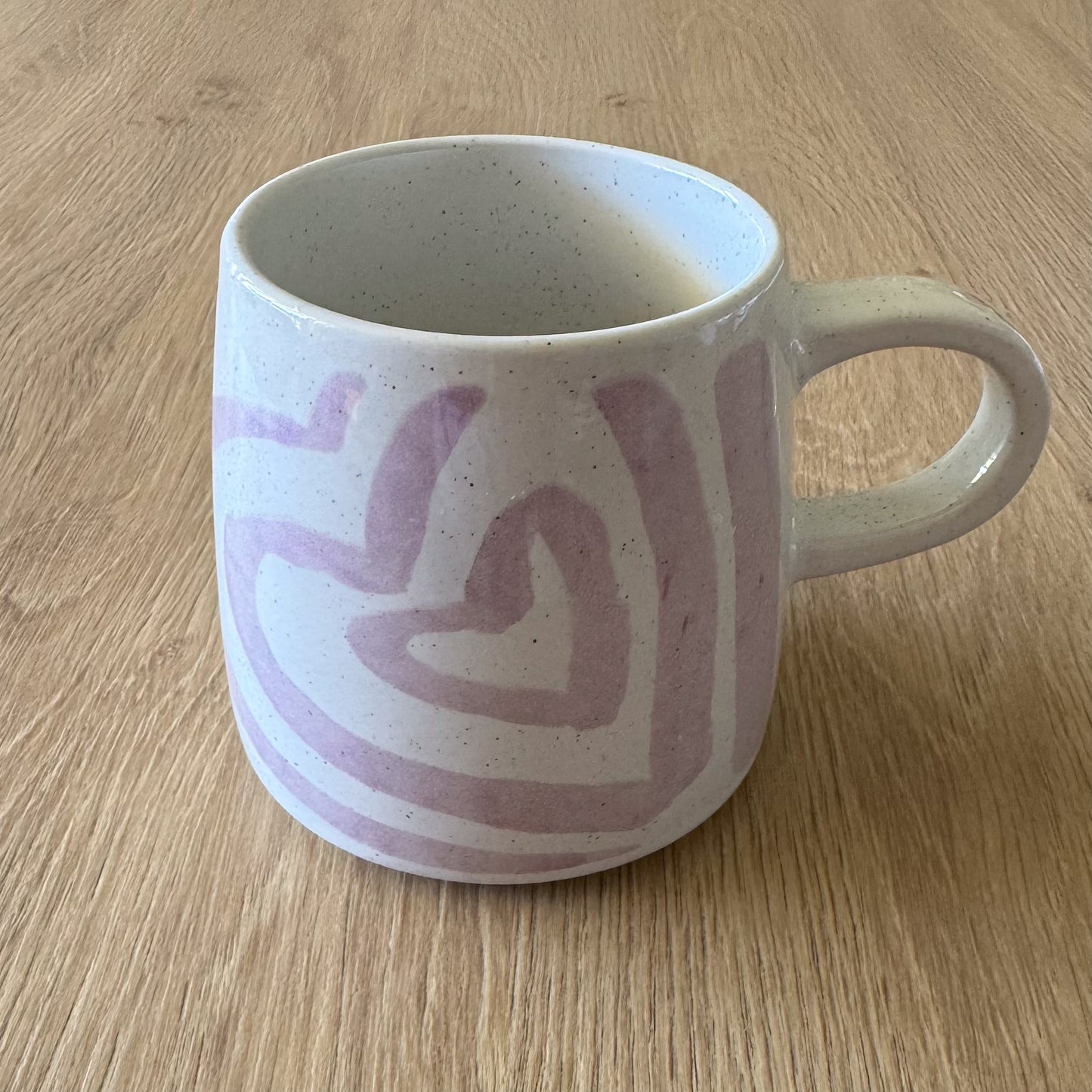 Stoneware mug with pink hearts from The Violet