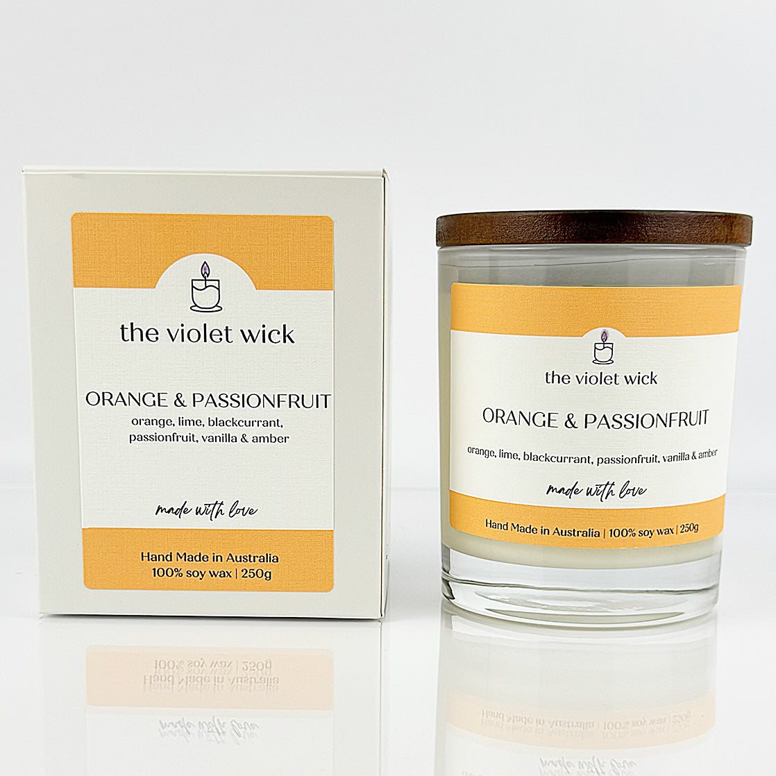 Orange & Passionfruit scented soy candle from The Violet Wick in glass jar with timber lid, 250g.