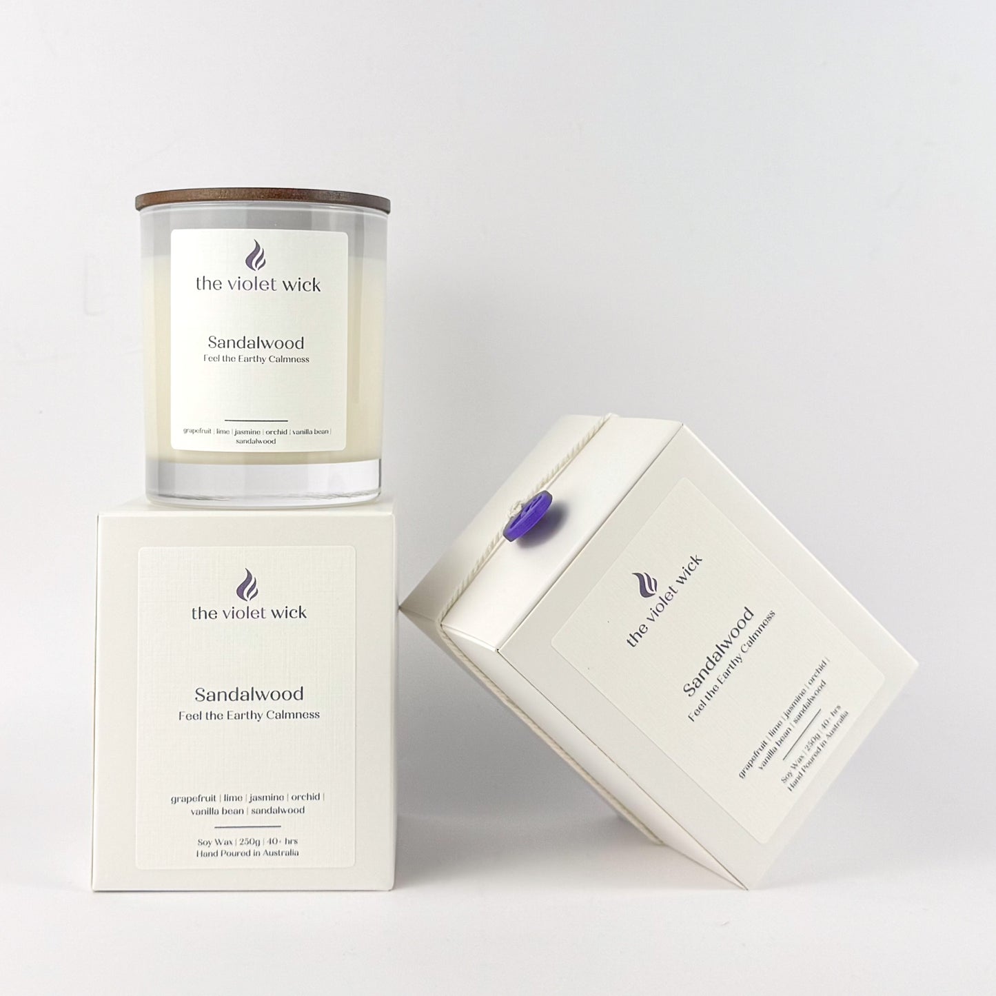 Sandalwood soy candle by The Violet Wick on white background