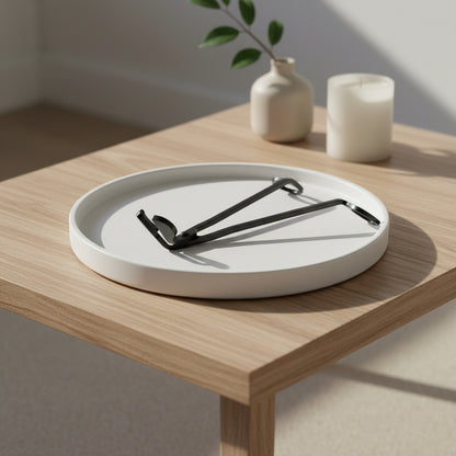 Black Wick Trimmer from The Violet Wick on white tray on timber coffee table