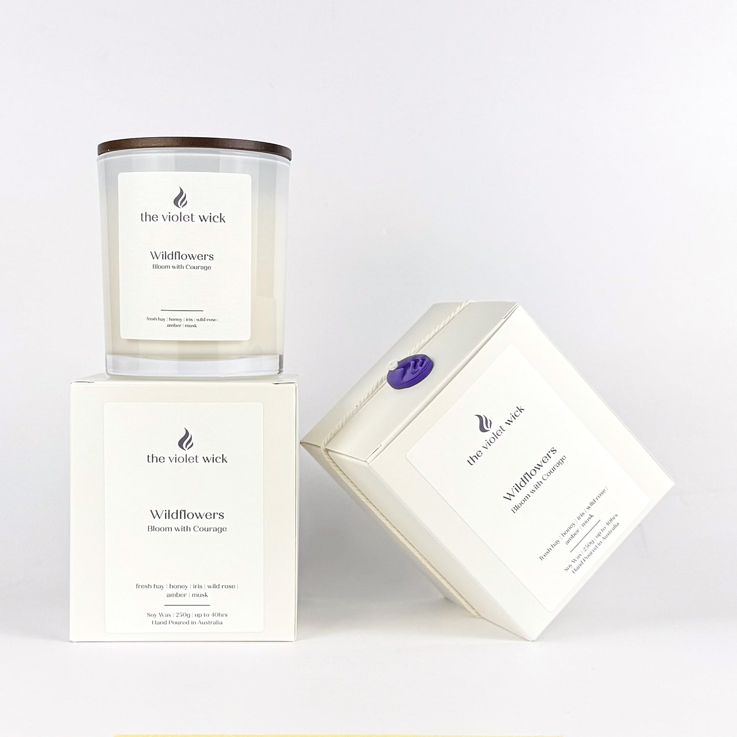 white candle jar and box on white background