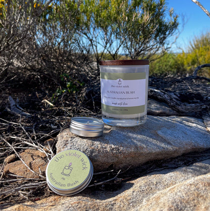 Australian Bush scented soy candle from The Violet Wick in bush setting. In a glass jar with timber lid, 250g.